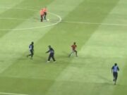 கால்பந்து போட்டியின் போது மைதானத்தின் ஆடுகளத்தை ஆக்கிரமித்த 3 பேர் கைது.